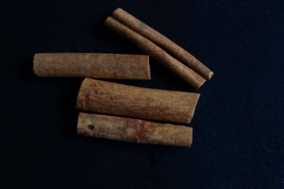 cinnamon sticks on a dark background