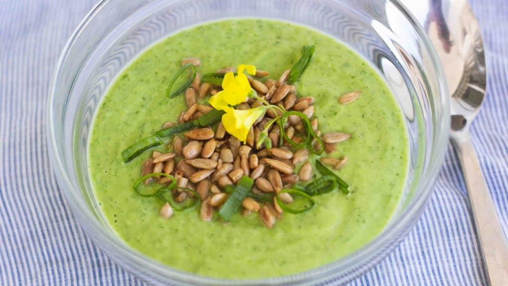 Chilled Sroorel soup served in a small glass bowl with a spoon beside