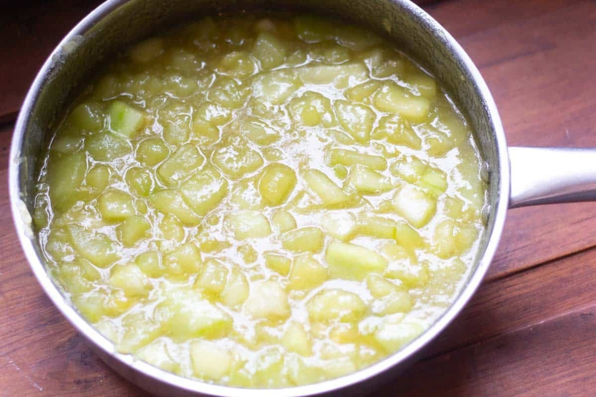 A large saucepan with marrow that has been cooked