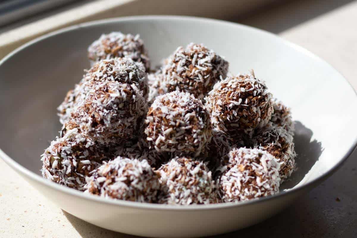 Swedish chocolate balls served in a white ceramic bowl
