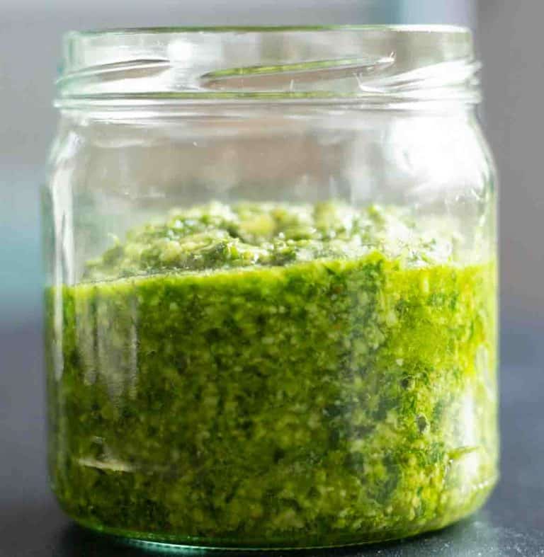 green wild garlic pesto in a glass jar