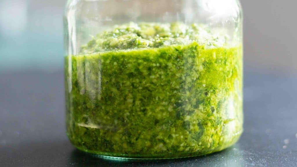 green wild garlic pesto in a jar
