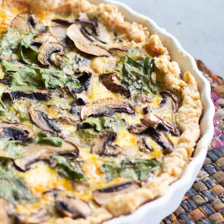 Wild spinach and mushrooms in a quiche